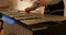 Man playing the vibraphone in french monastery. Close shot of handsome man hands on the vibraphone