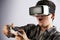 Man Playing Video Game Wearing Virtual Reality Headset