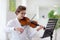 Man playing violin. Classical music instrument