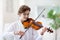 Man playing violin. Classical music instrument