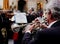 Man Playng Brass Lacquered Trumpet during Outdoor Concert