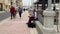 Man plays hang music in the street of Bugibba, Malta