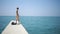 Man plunging in the water. tourist swims in the sea. Blue water and waves