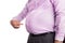 Man pointing own unhealthy big belly with visceral subcutaneous