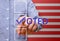 Man pointing tick mark, voting symbols ,presidential election