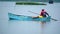 Man poling a boat in La Segua Wetland