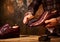 Man polishing leather shoes with brush