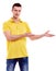 Man in polo shirt showing empty copyspace