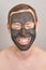 Man portait with face mask. Smiling emotion