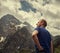 Man portrait on the mountain peaks view