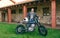 Man posing with a custom motorbike