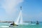 Man posing at new flyboard at Caribbean tropical beach. Positive human emotions, feelings, joy. Funny cute men making vacations an