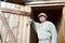 Man posing in Scandinavian folk clothes on doorstep