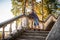 Man posing on stairs n forest