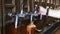 Man pouring beer into a plastic bottle. Beer bottling plant. Barman serves in the tavern.