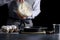 Man pouring dough for pie. cake making concept