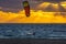 A man that practice kitesurf during in a sunset in tarifa, Spain