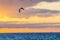 A man that practice kitesurf during in a sunset in tarifa, Spain