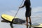 Man practicing Stand Up Paddle in the waters of Lake IgapÃ³