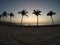 Man practicing yoga ocean beach salalah Oman 4