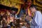 Man praying for new year ,Lighting incense to Buddha.