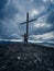 A man prays on a mountain in front of a cross-beautiful wallpaper
