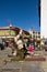 A man prays to Jokhang Temple in Barkhor Square, Lhasa Tibet