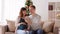 Man and pregnant woman taking selfie at christmas