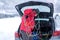 Man prepares chains for tires on a cold day