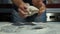 Man prepares dough for baking. Cooking pizza at home