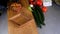 Man prepares lunch, serves grilled bread sandwich snack on top of wooden cutting board, with side of green salad