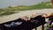 Man preparing barbecue on the lake.