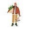 Man preparing for Christmas, winter holidays, standing with Xmas purchases. Modern guy after festive shopping, holding