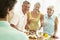 Man Preparing Food For Dinner Party