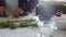 Man is preparing fresh and original dish in kitchen