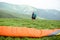 Man preparing for the paraglider flight