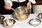 Man preparing scrambled eggs in the kitchen