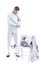 Man professional fencer putting on protective costume on white