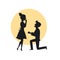 Man proposing to a woman kneeling, romantic couple silhouette