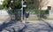 Man with a protective mask walks the dog in Italy. It`s one of the few activity allowed by the government to combat coronavirus