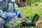 A man in a protective suit analyzes water in a mobile laboratory using special reagents