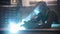 A man in a protective suit is engaged in welding items. Bright welding light