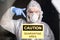 Man in protective white overalls, mask and glasses on his face. Coronavirus, pandemic, covid-19, flu and quarantine