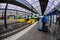 Man pulling trolleys at Helsinki Central Trainstation, Finland