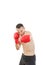 Man punching with red boxing gloves isolated on white background