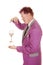 Man purple suit drink between hands side