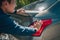 Man pushing a broken car breakdown on the road hot day. Car broken concept