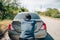 Man pushing a broken car breakdown on the road hot day. Car broken concept