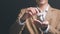 Man putting coins into a glass jar ,finance and banking, fund growth and savings concept, saving money for the future, efficient