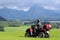 A man on quad before the mountains in Bavaria